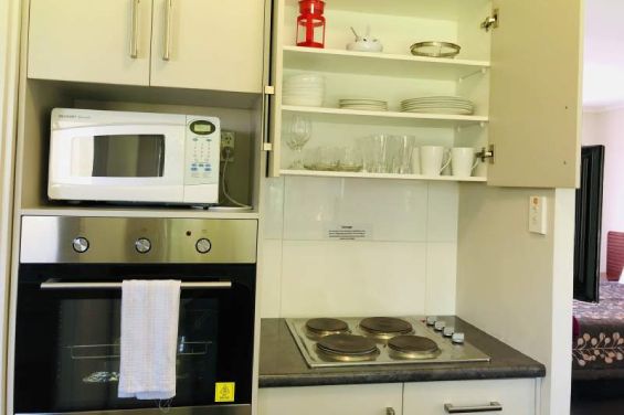 Deluxe One Bedroom Unit - kitchen